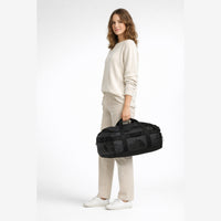 KI-generierte Darstellung – The North Face Base Camp Voyager Duffel 32 - Reisetasche 57.6 cm (tnf black/asphalt grey)